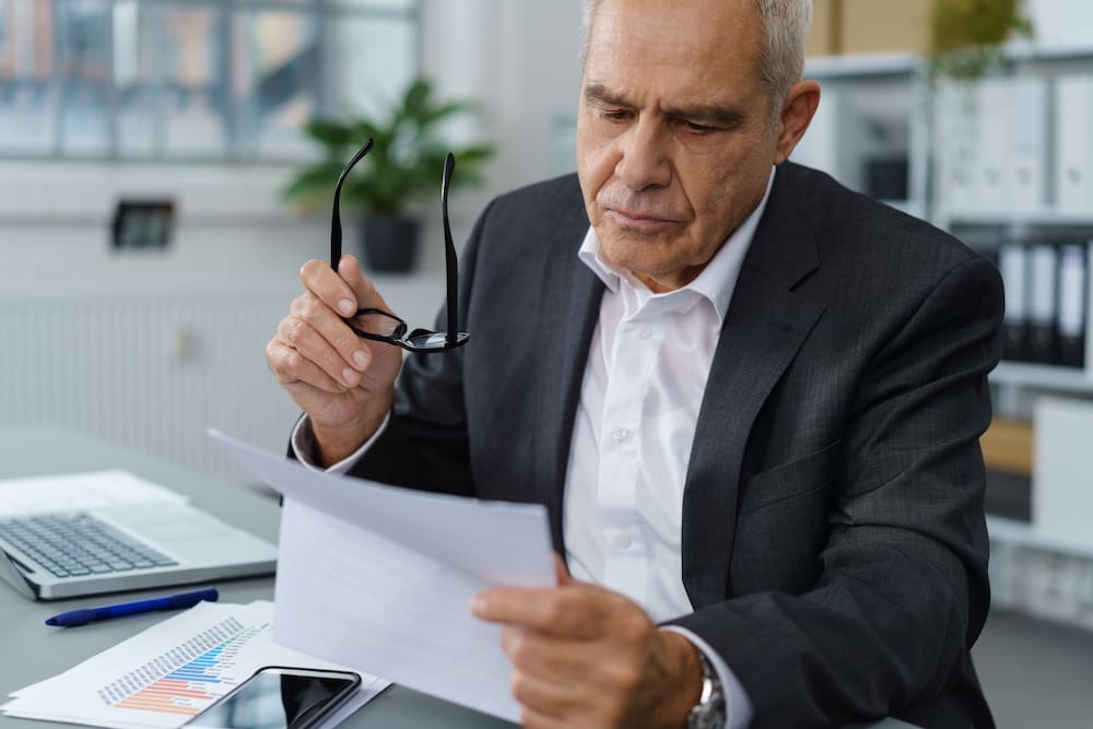 businessman reading letter