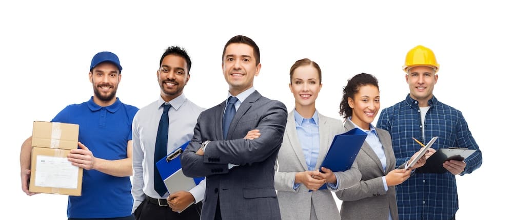Employees in different uniforms and professional clothing