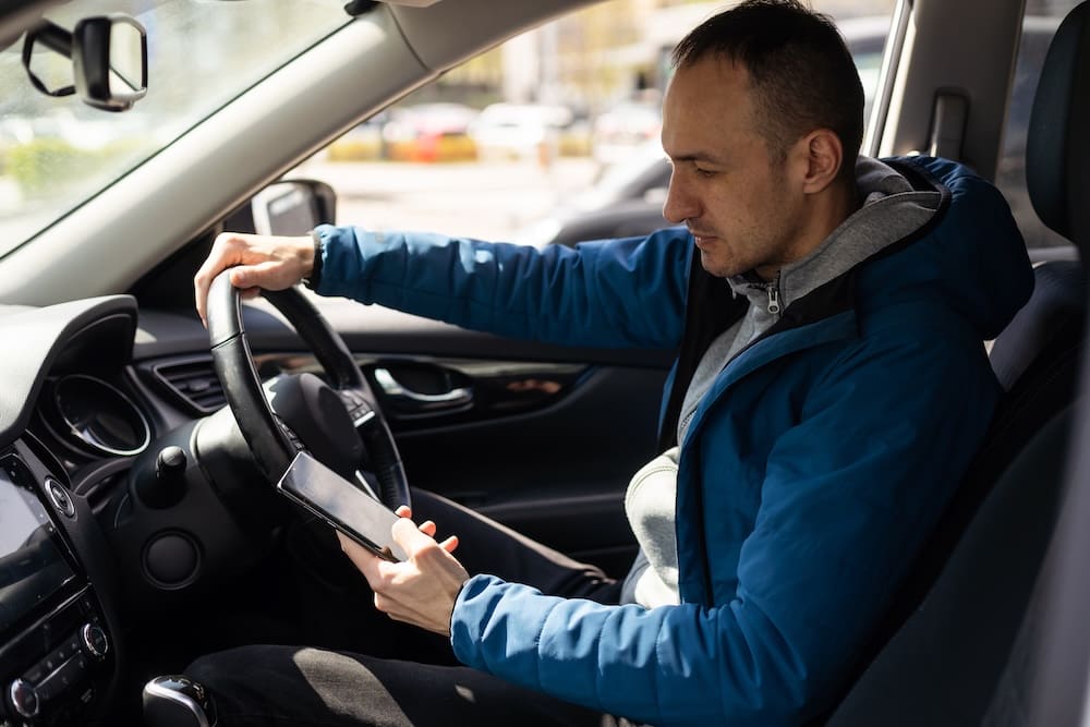 Man driving rideshare car