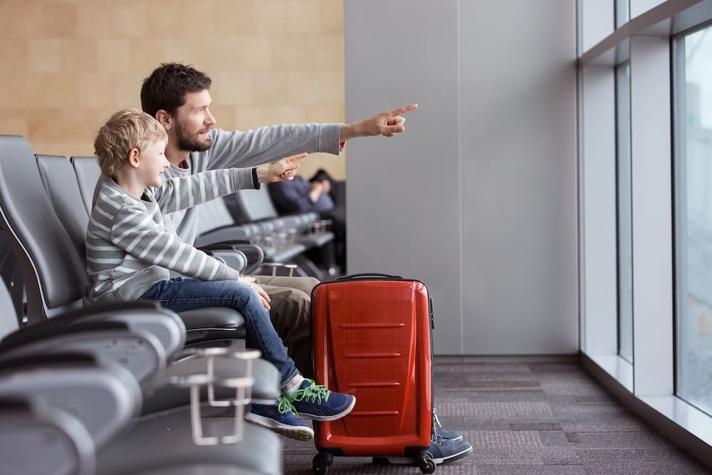 Father and son at the airport.